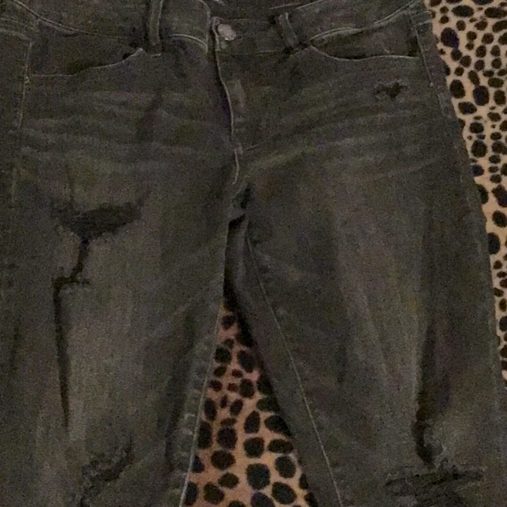 Black,ripped American eagle leand